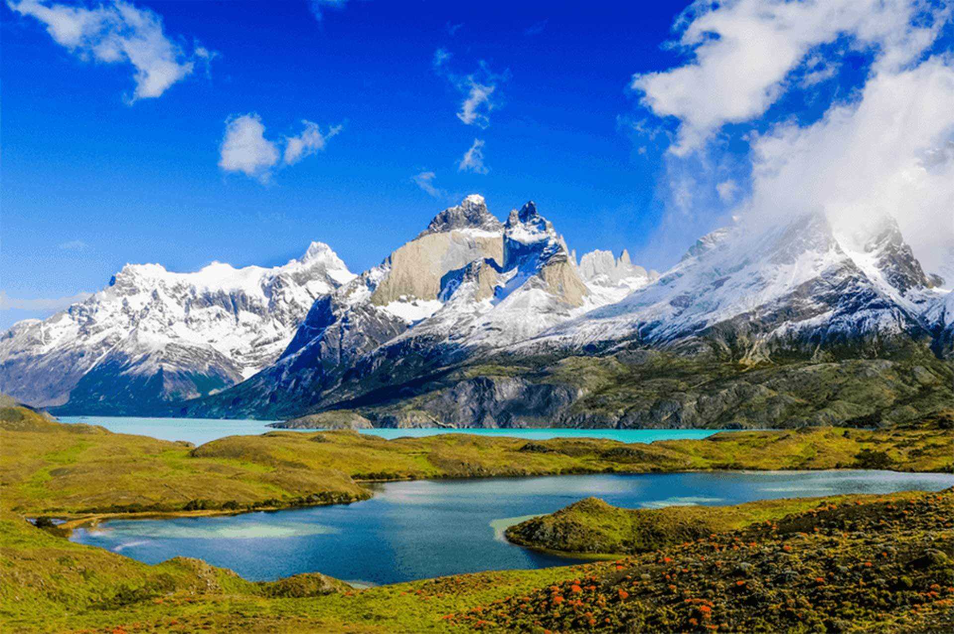 A jagged, icy mountain peak in Patagonia reflected in a lake